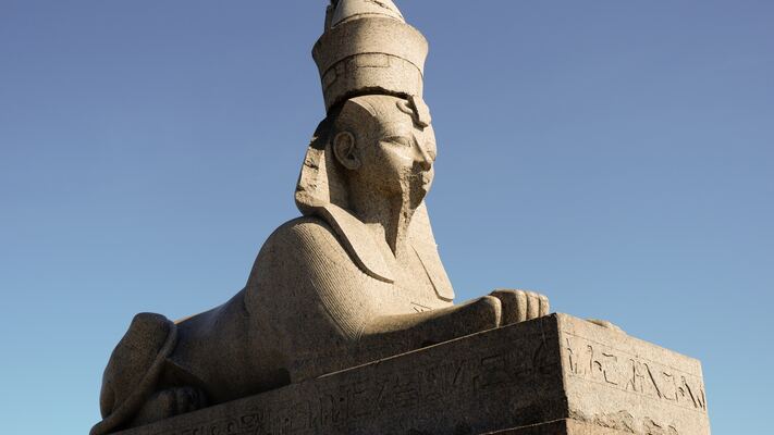 A stone statue of a Sphinx